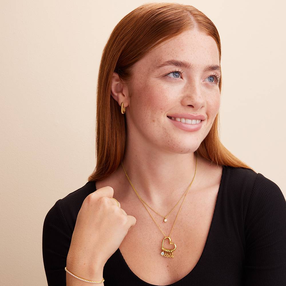 Delina Halskette mit Tropfen-Initialen und 0,25 ct Diamant - 417er Gelbgold-6 Produktfoto