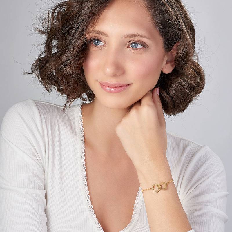 Claire Armband mit verschlungenen Herzen - Vergoldet-1 Claire Armband mit verschlungenen Herzen - Vergoldet-1 Produktfoto