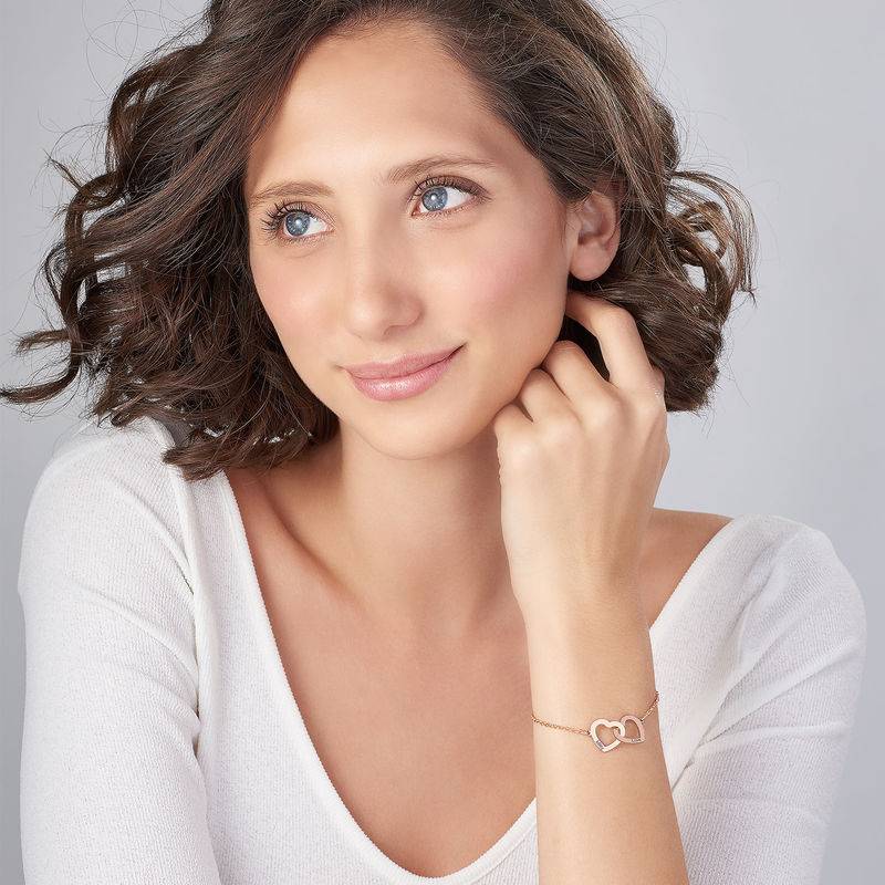 Claire Armband mit verschlungenen Herzen - rosévergoldetes Sterlingsilber-1 Claire Armband mit verschlungenen Herzen - rosévergoldetes Sterlingsilber-1 Produktfoto